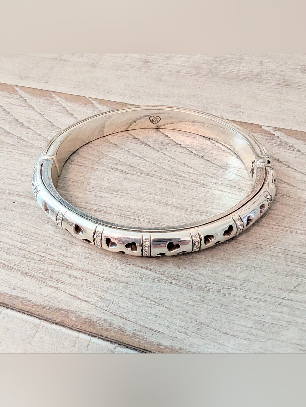 Brighton silver heart cutout hinged bangle bracelet